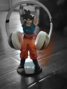 Beats Headphones held by a Goku from DBZ