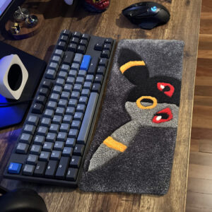 A fluffy keyboard rug featuring Umbreon the Pokemon