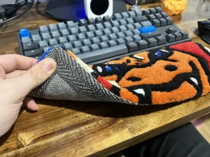 Closeup photo of the stitching of a Tufted Keyboard Rug